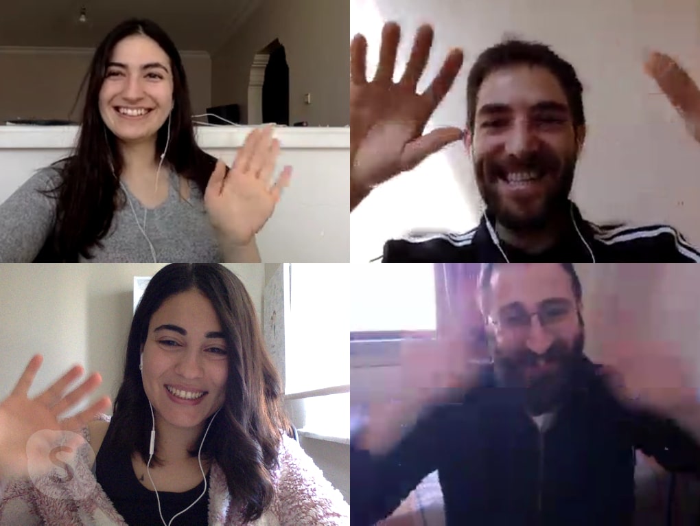 A group of people posing for the camera

Description automatically generated
